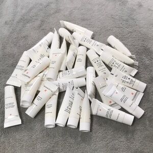 Swissgetal 33 .1oz bottles of random skin care samples